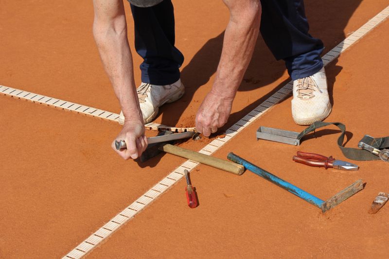Local Tennis Court Restoration pros at work